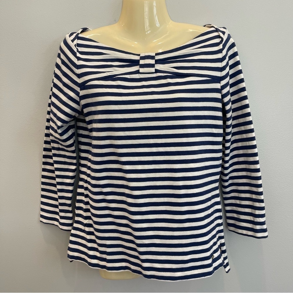 Kate Spade Wheaton Top of Mandy Bax­ter (Mol­ly Ephraim) in Last Man Stand­ing